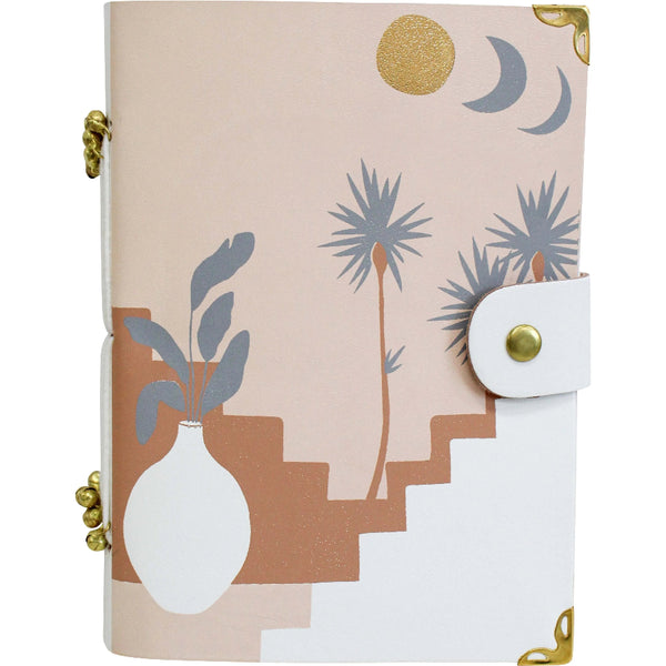 Patterned notebook with decorative elements on a white background