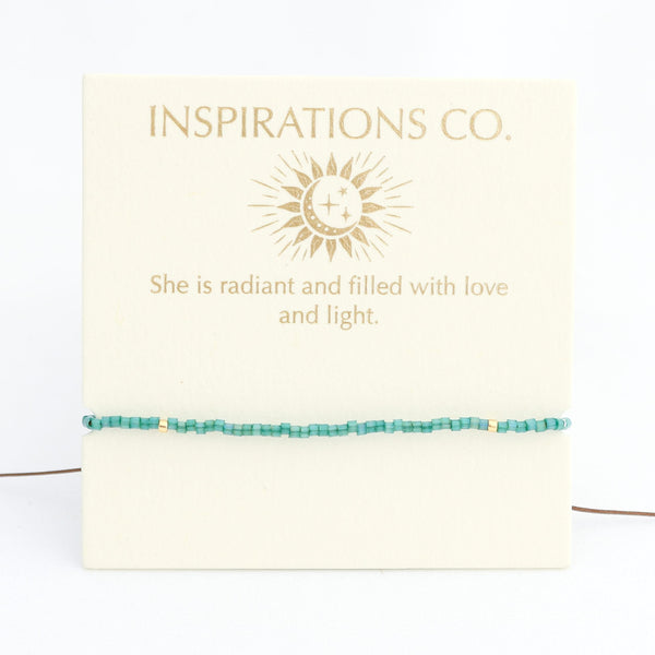Turquoise beaded bracelet on a card with 'Inspirations Co.' branding and a quote.