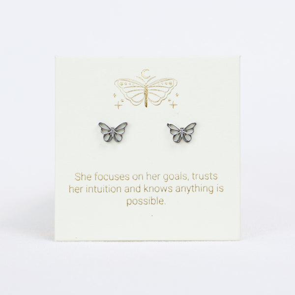 Butterfly earrings on a card with motivational quote on a white background