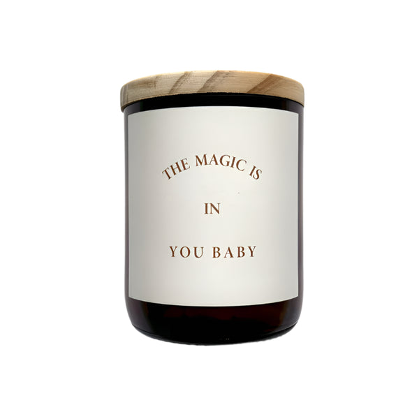 Candle with a wooden lid and a label on a white background