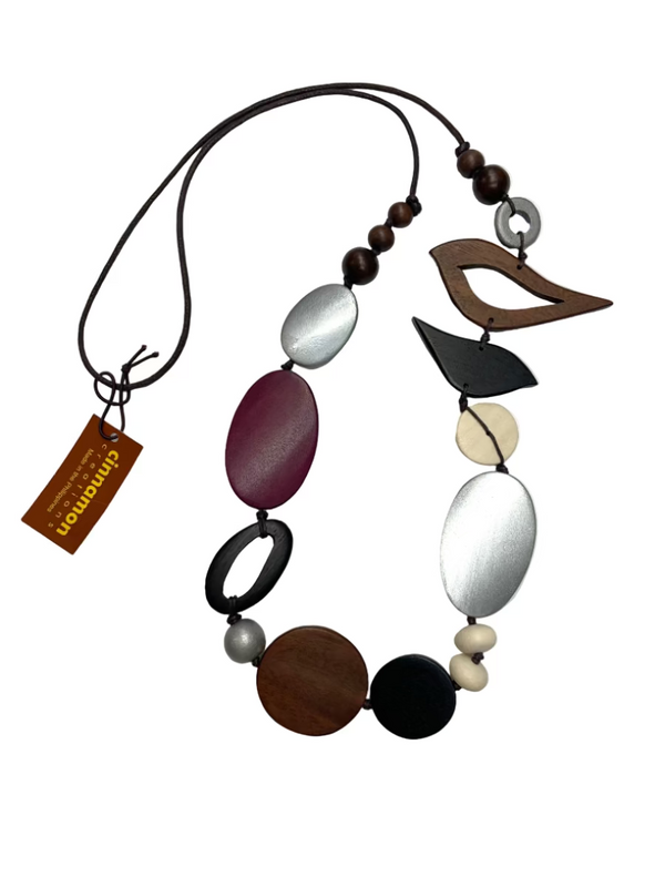 Necklace with various shaped beads on a white background