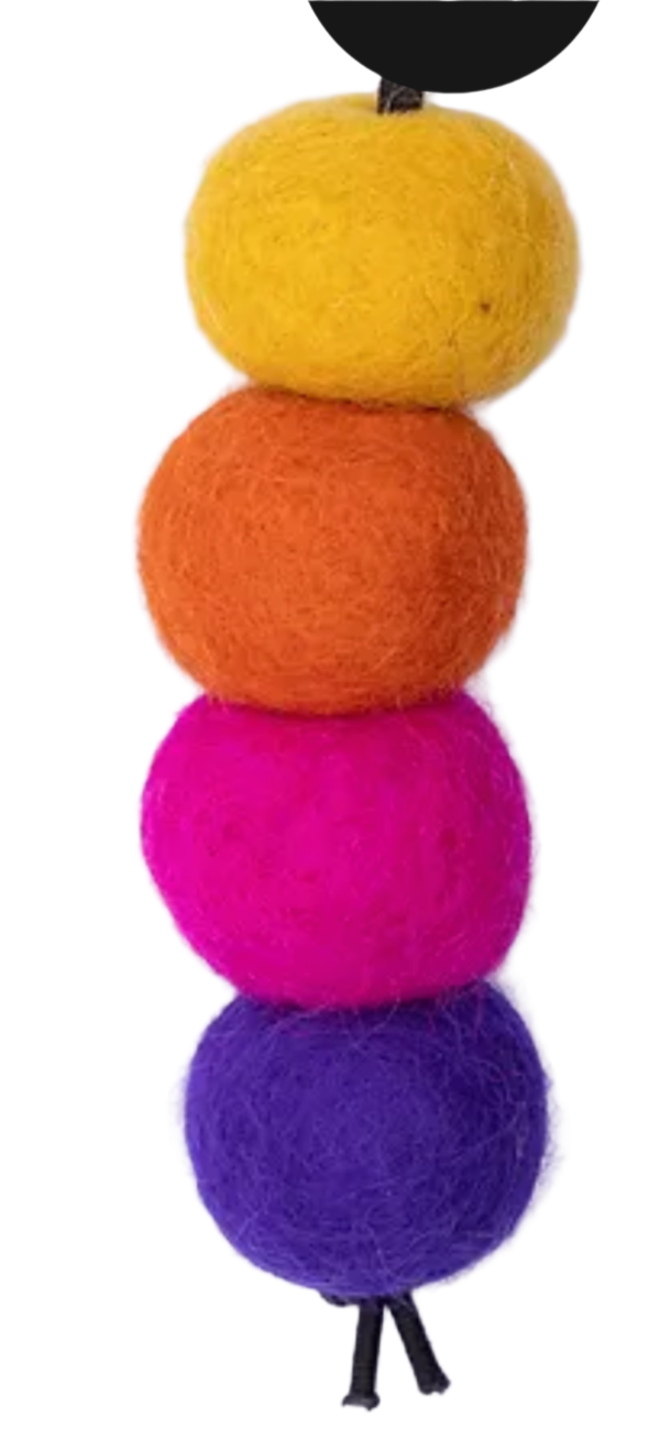 Four colorful felted balls on a white background