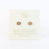 Lotus flower earrings on a light background with a quote.