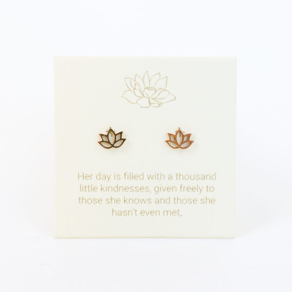 Lotus flower earrings on a light background with a quote.