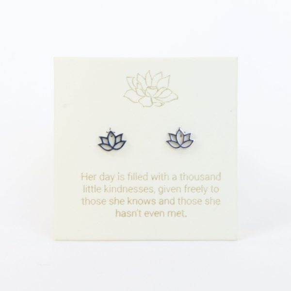 Lotus-shaped earrings on a card with a quote about kindness.