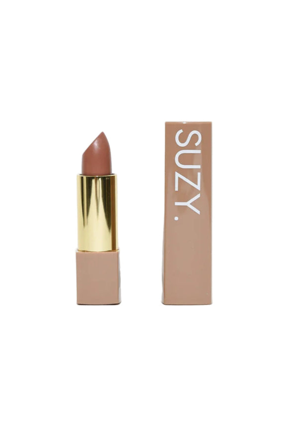 Lipstick with gold cap and 'SUZY' branding on a white background