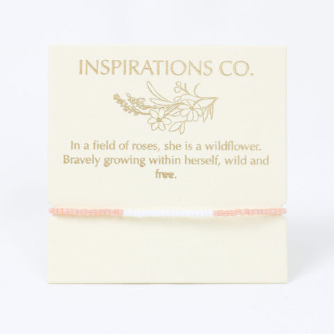 Card with gold text and branding on a white background