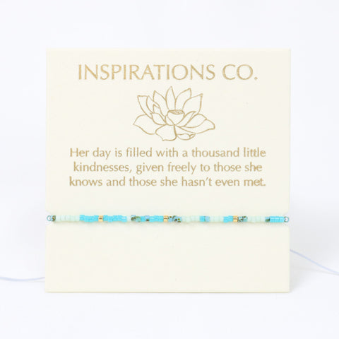Bracelet on a card with 'Inspirations Co.' branding and text.