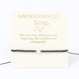 Bracelet with inspirational message on a white card, featuring the brand 'Inspirations Co.'