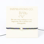 Bracelet with inspirational message on a white card, featuring the brand 'Inspirations Co.'