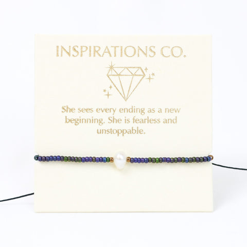 Bracelet with inspirational message on a white card, featuring the brand 'Inspirations Co.'