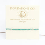 Turquoise beaded bracelet on a card with 'Inspirations Co.' branding and a quote.