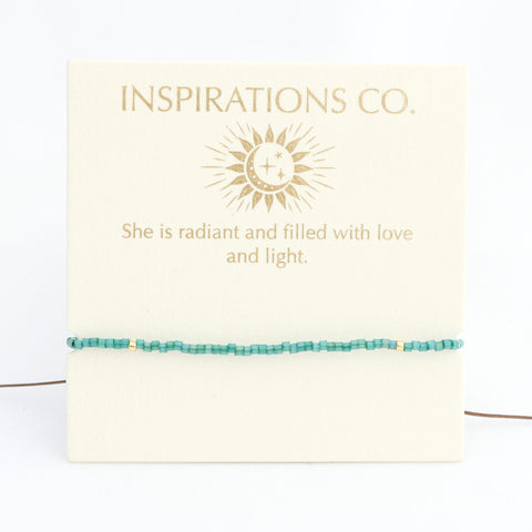 Turquoise beaded bracelet on a card with 'Inspirations Co.' branding and a quote.