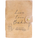 Brown leather notebook with 'Live Love Bake' text and baking-themed illustrations on a white background