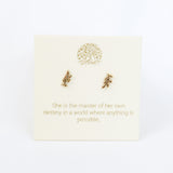 Gold leaf earrings on a card with motivational quote