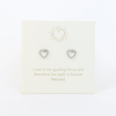 Heart-shaped earrings on a card with a motivational quote