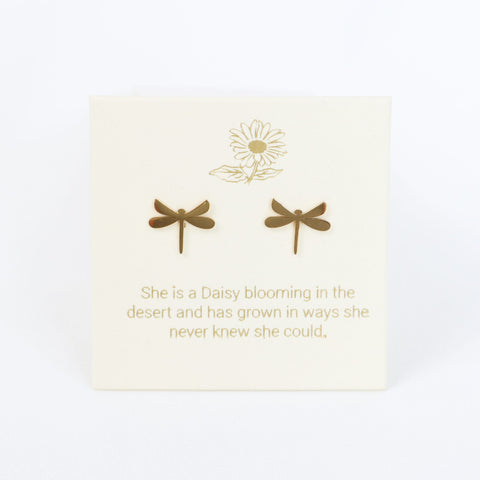 Motivational card with gold text and illustrations on a light background