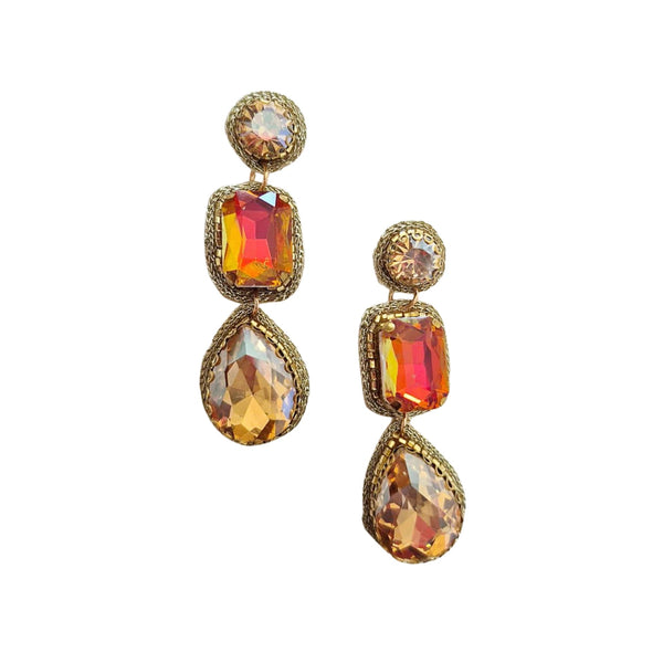 Gold earrings with colorful gemstones on a white background