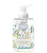 Michel Design Works foaming shea butter hand soap bottle with butterfly fields design on a white background
