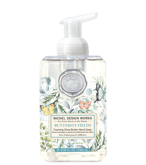 Michel Design Works foaming shea butter hand soap bottle with butterfly fields design on a white background