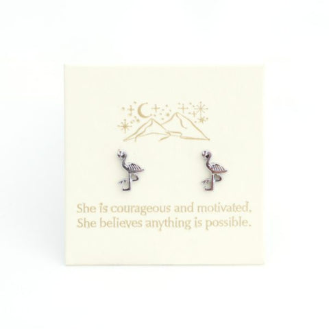 Flamingo-shaped earrings on a card with motivational quote
