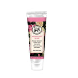 Hand cream tube labeled 'Midnight Rose' with floral design on a white background