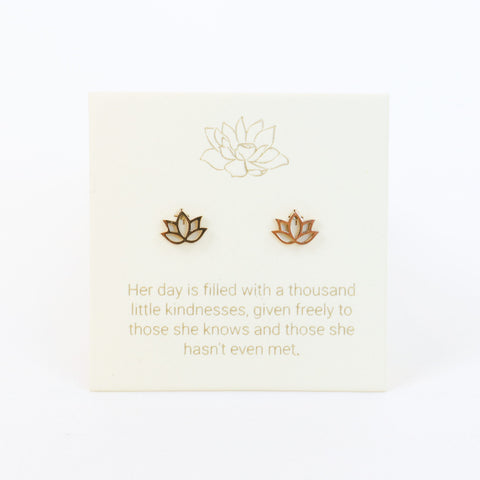 Lotus flower earrings on a light background with a quote.