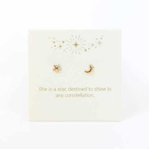 Gold star and moon earrings on a card with motivational quote