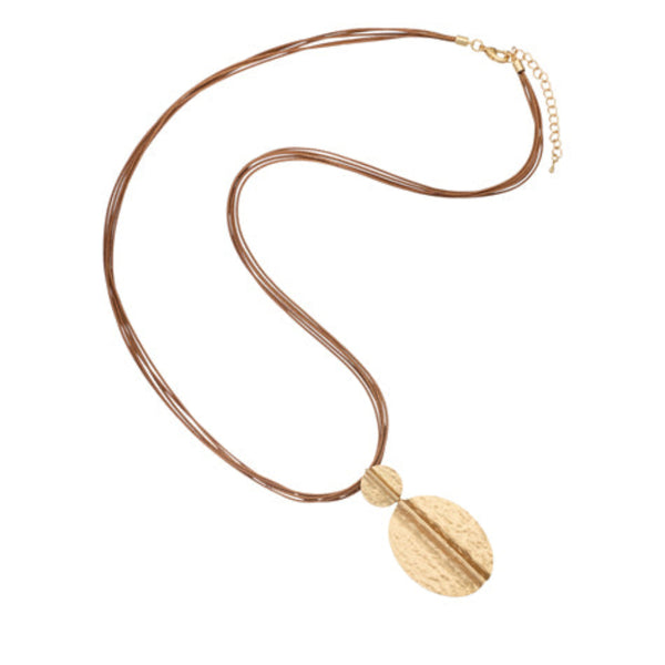 Gold necklace with a leaf-shaped pendant on a white background