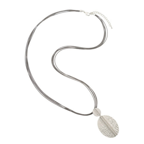 Silver necklace with a textured pendant on a white background