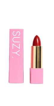 Red lipstick with pink packaging and 'SUZY' branding on a white background