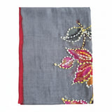 Gray scarf with colorful floral embroidery on a white background