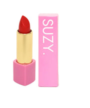 Red lipstick with pink casing and 'SUZY' branding on a white background
