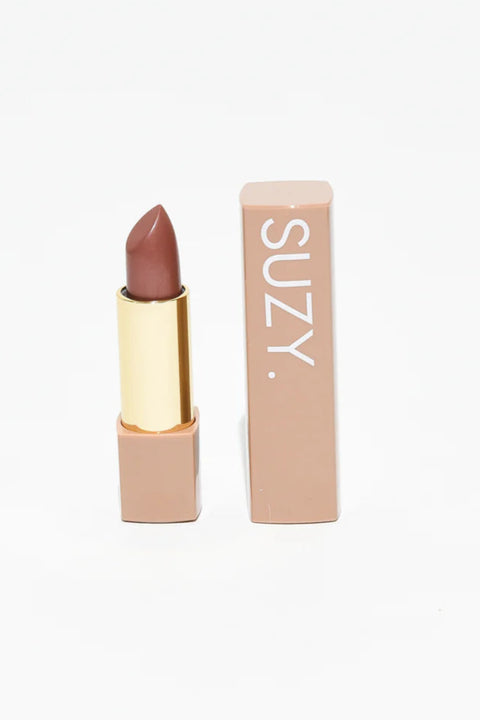 Lipstick with case labeled 'SUZY' on a white background