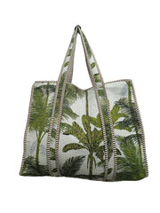 Tote bag with palm tree design on a plain background