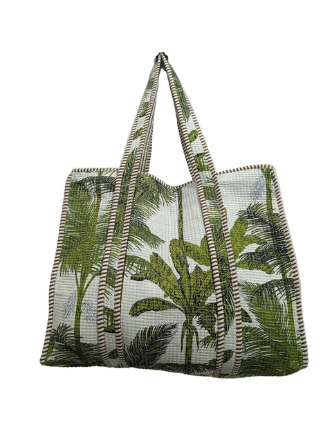 Tote bag with palm tree design on a plain background