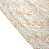 Patterned fabric with gold floral design on a white background