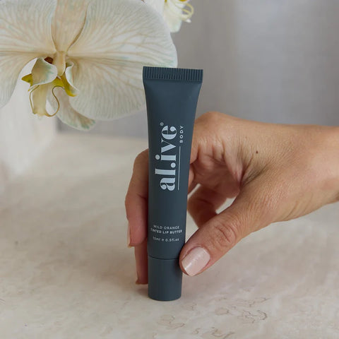 al.ive body tinted lip butter - wild orange