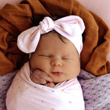 Twinkle Organic Topknot